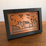 Small framed plaque